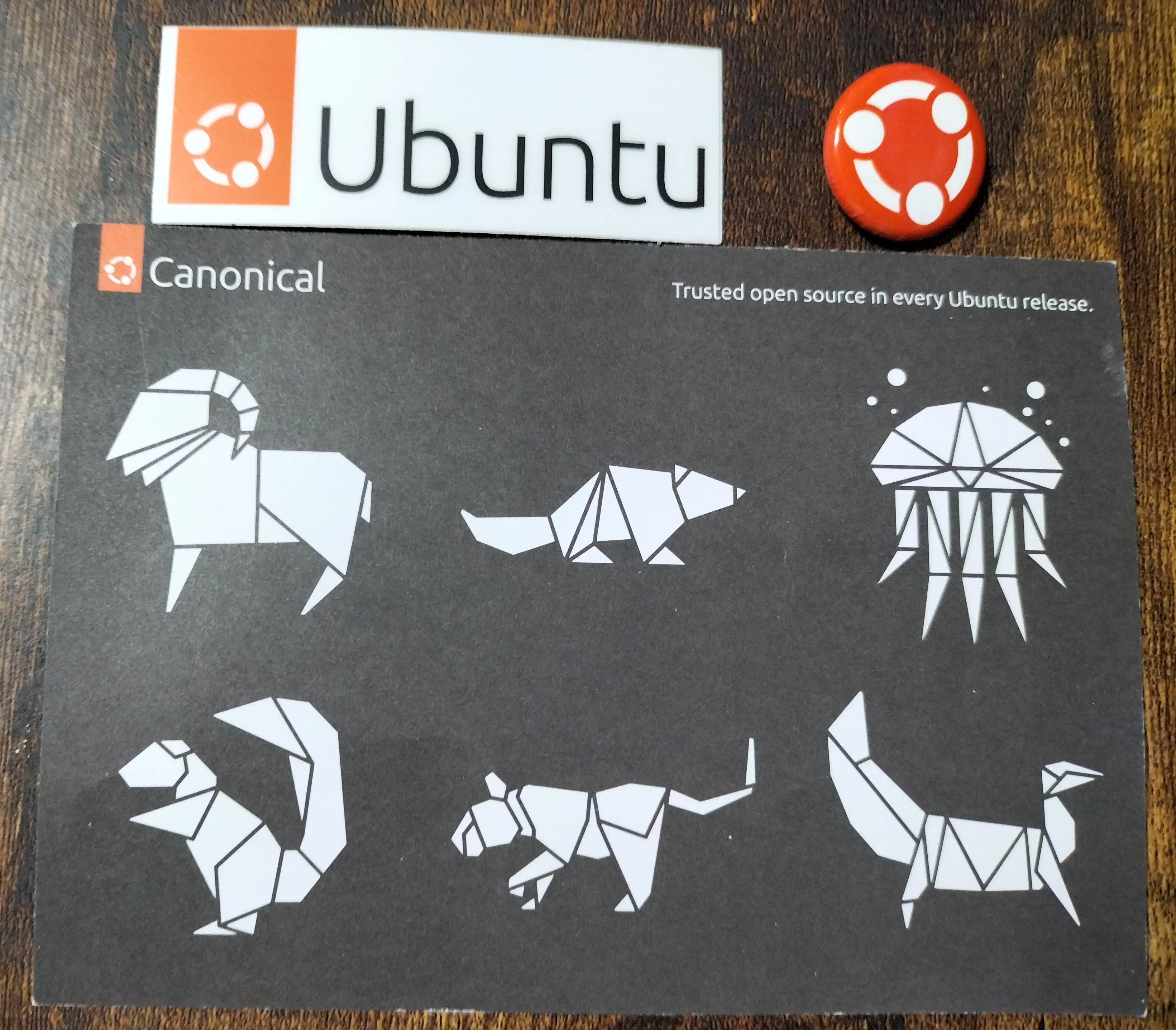Ubuntu/Canonical post-card and badge and sticker